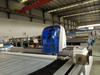 Automatic fabric cutting machine for apparel manufacturing
